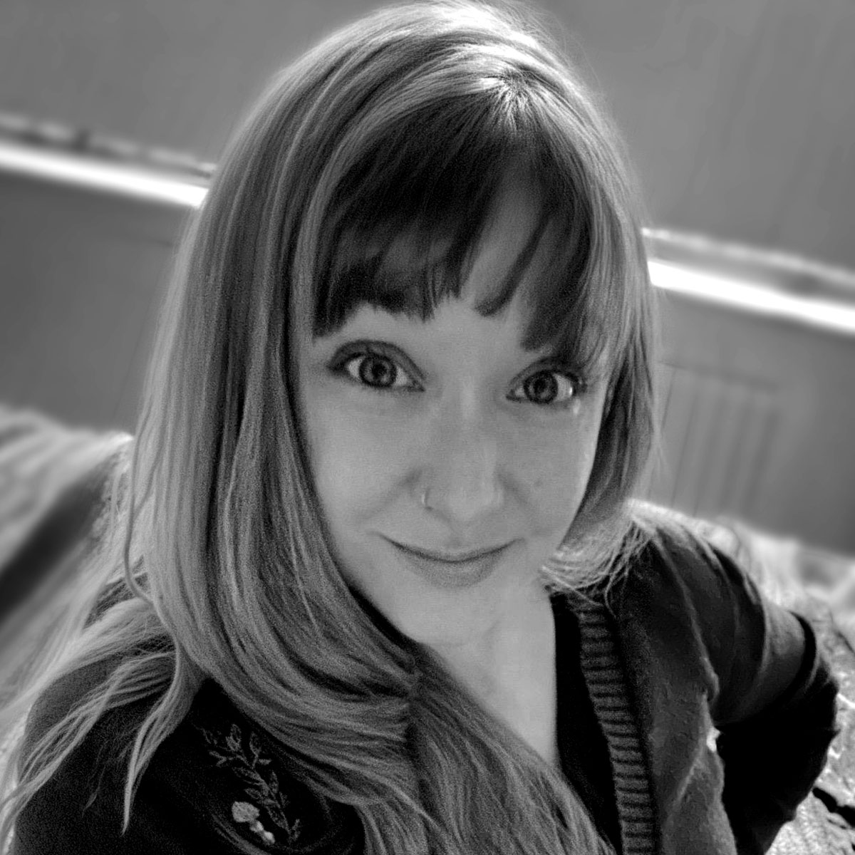 A portrait picture of Nikki Poulton, of the Bound by Books podcast